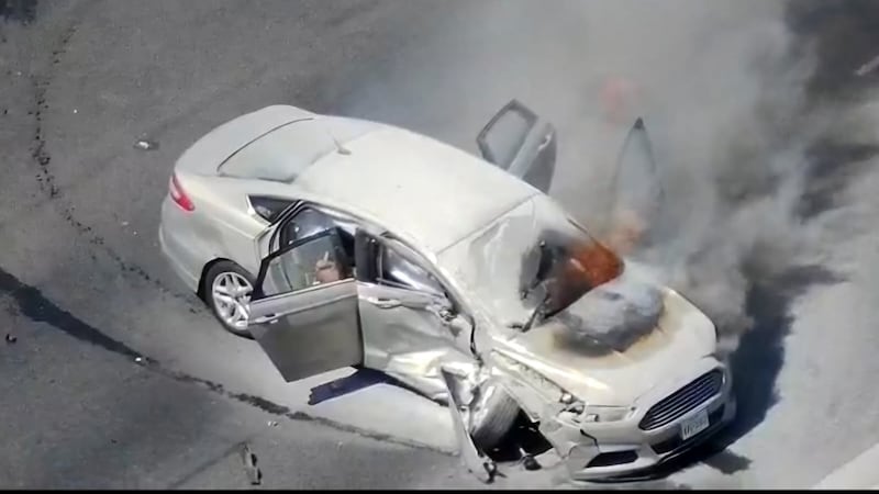 Car on fire on San Dario