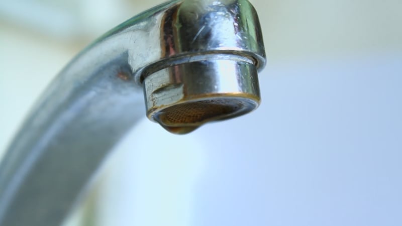 Faucet head with water coming out
