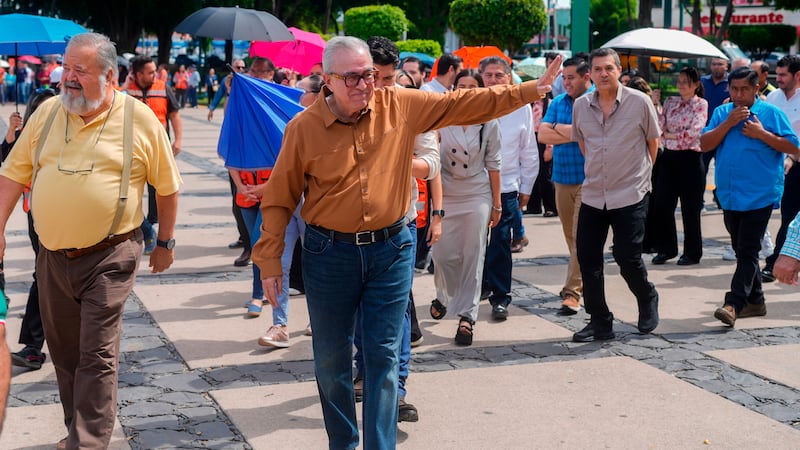 FILE - Sinaloa state Gov. Ruben Rocha waves as he takes part in an annual earthquake drill in...