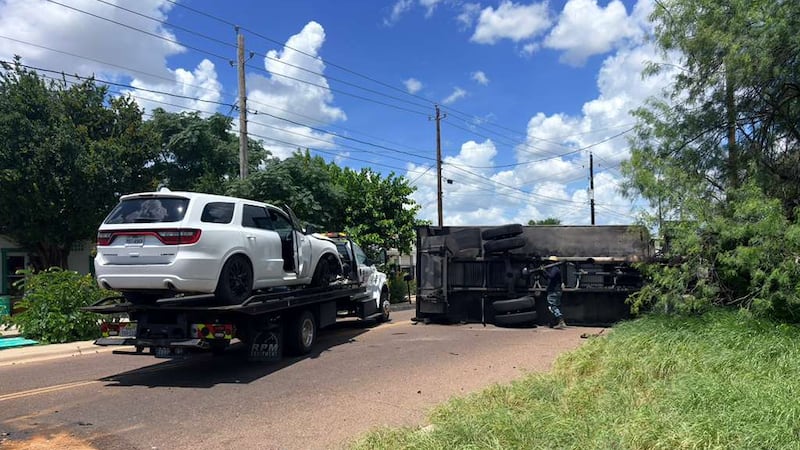 Box trailer overturns on Corpus Christi St., closes both lanes