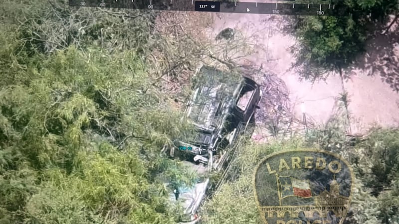 Driver hospitalized after vehicle drives off bridge on Aguila Azteca Drive