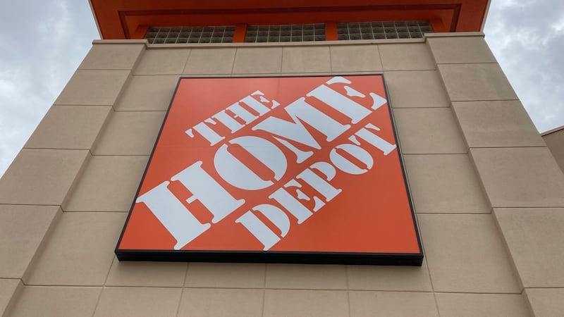 FILE - A Home Depot logo sign hands on its facade, Friday, May 14, 2021, in North Miami, Fla.